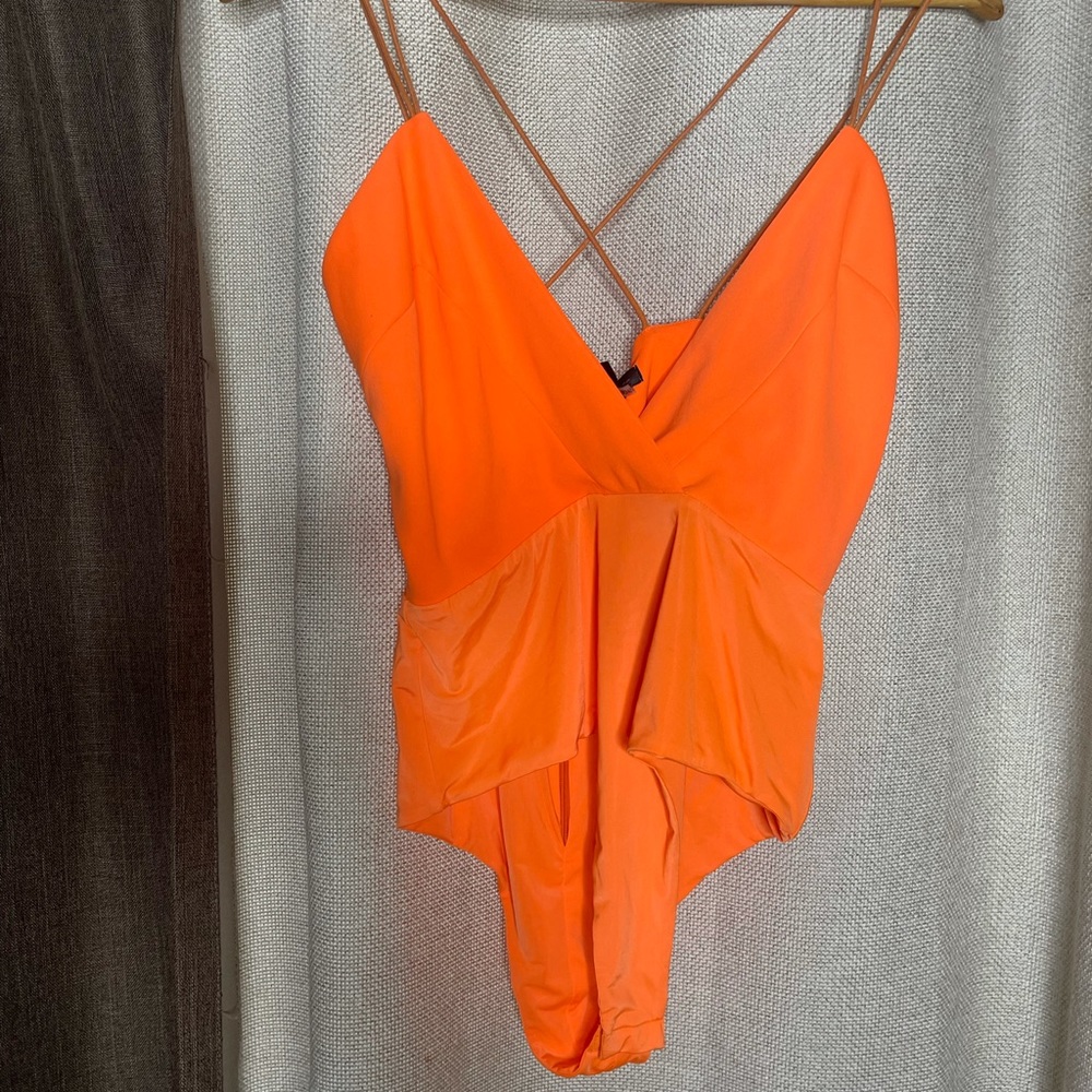 Bright Orange bodysuit in size Small only used once